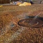 Rescatan con vida niña arrastrada por las lluvias hasta alcantarilla en San Cristóbal