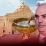 Abinader dice que se echa «agua bendita» ante crisis para tener más suerte