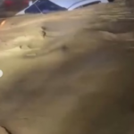 Crecida de río Nizao provoca salida apresurada de vacacionistas y daños a vehículos