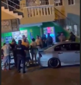 Comerciantes de Los Alcarrizos exigen el fin de presuntos abusos de la Policía